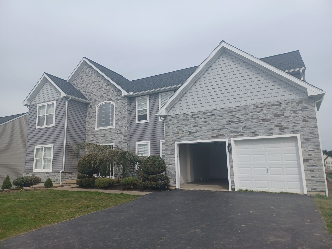 Gennadiy residence after siding and deck build
