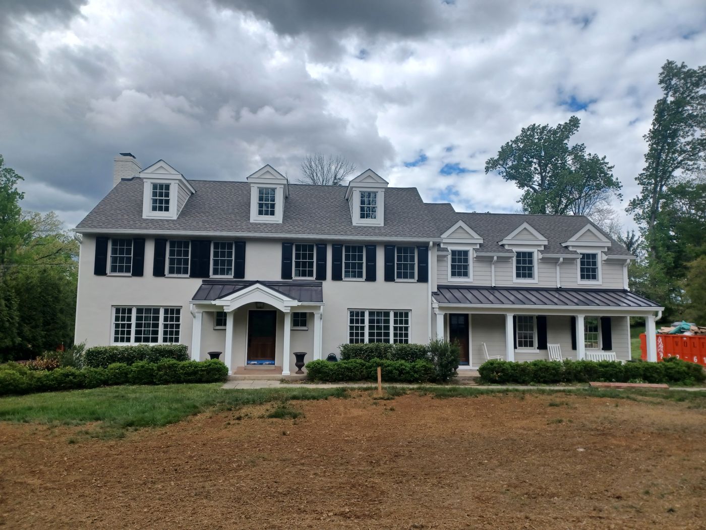 Colonial home with new roofing and siding by Mountain View Exteriors